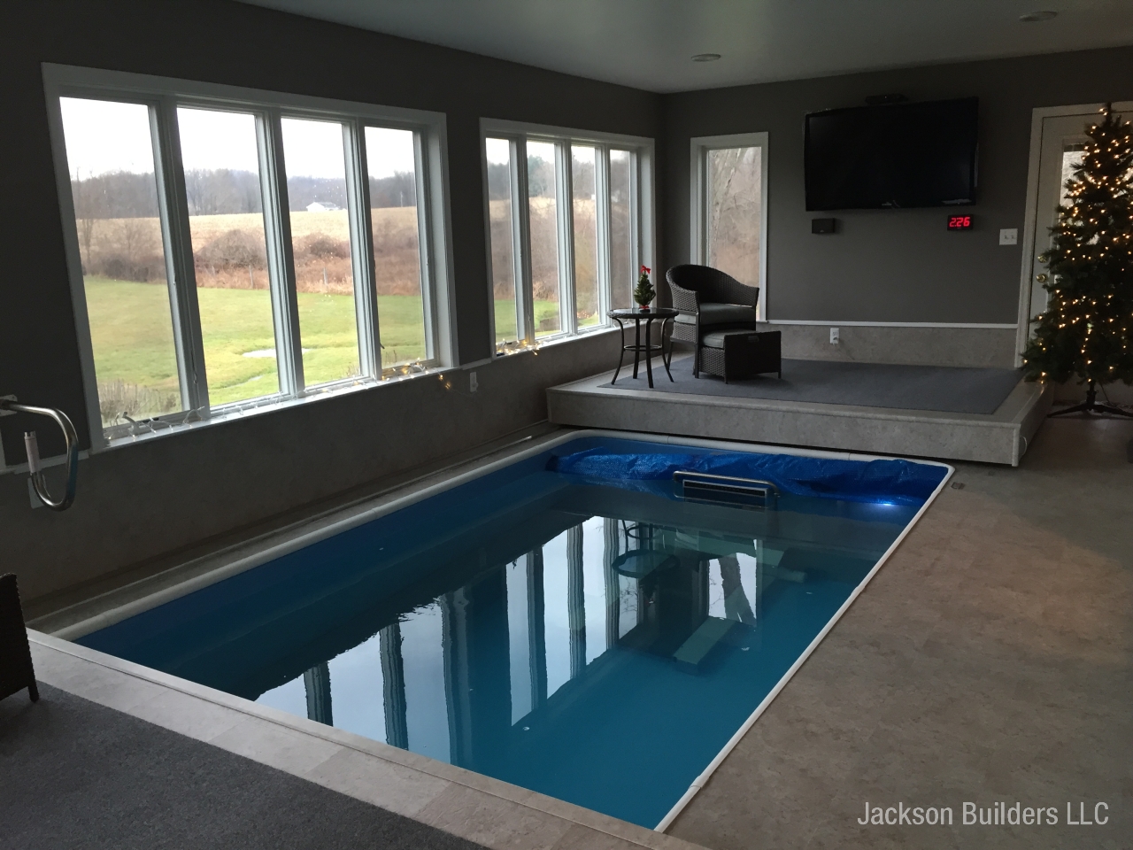Indoor pool in glass sunroom