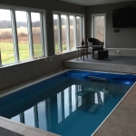 Indoor pool in sunroom
